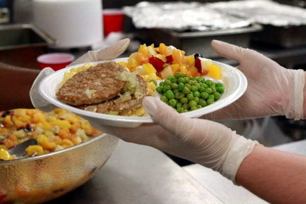 handing out a meal